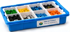 Boîte de robotique avec ses compartiments de pièces de construction.